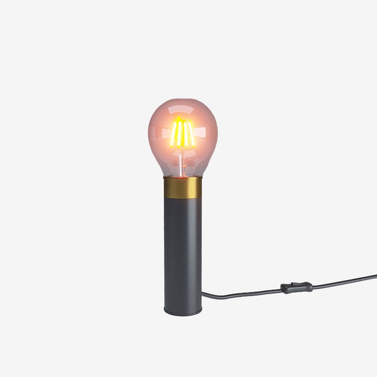 Lampe de chevet à poser sur la table de nuit, style industriel moderne cylindrique en métal noir et doré - Potiron Paris, luminaire design de la décoration d'intérieur chic et moderne pas chère