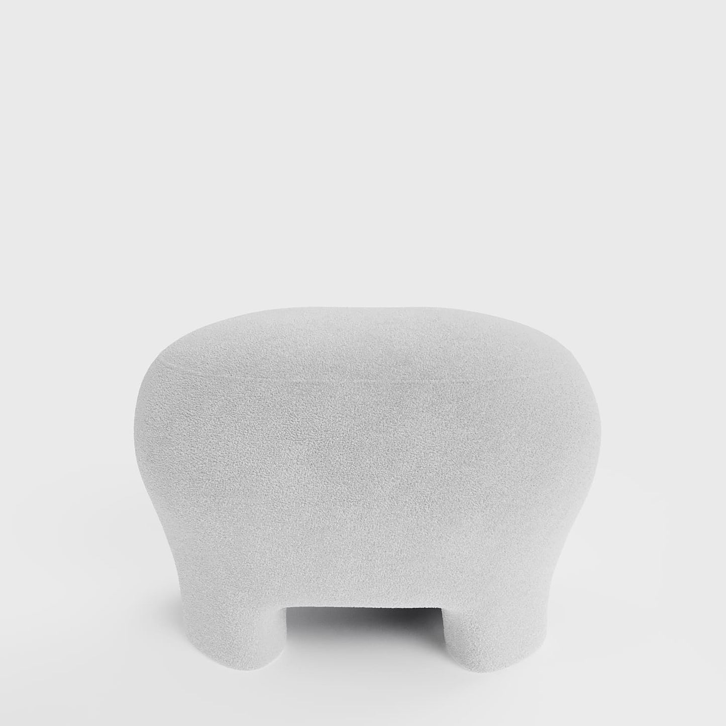 Ninon – Pouf repose-pieds tapissé en bouclette blanche Potiron Paris