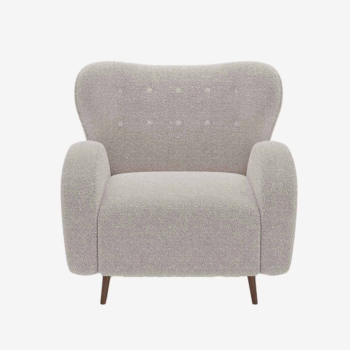 Fauteuil confortable en tissu bouclé crème